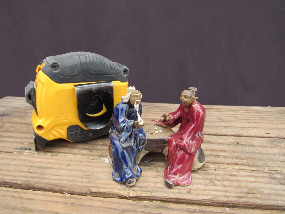 Men Playing Go Figurine Scale