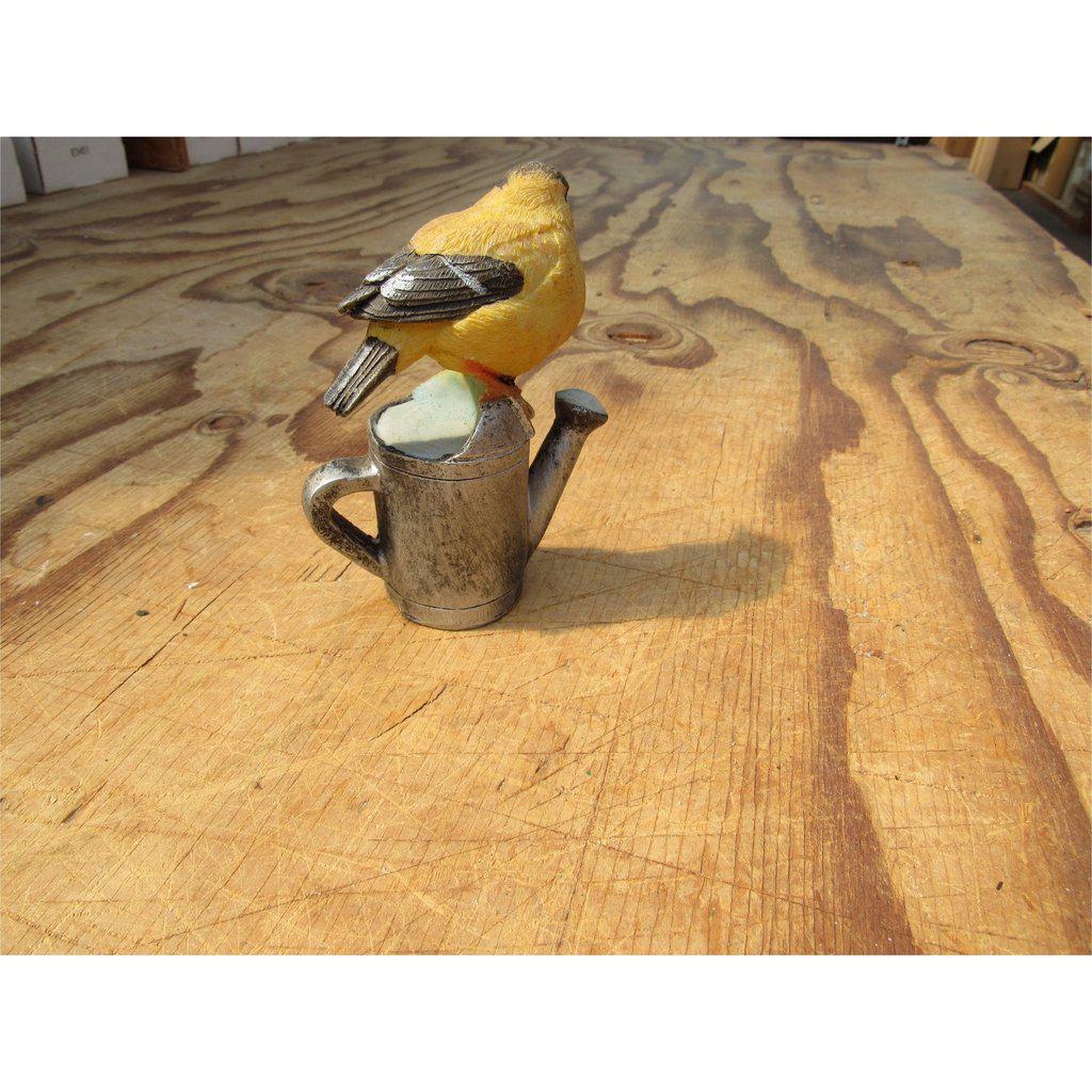 Bird on a Watering Can Figurine Back
