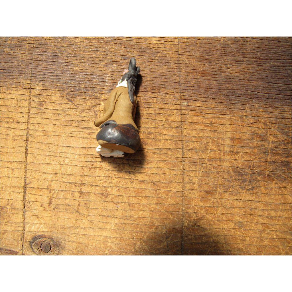 Female Musician Mud Figurine Back