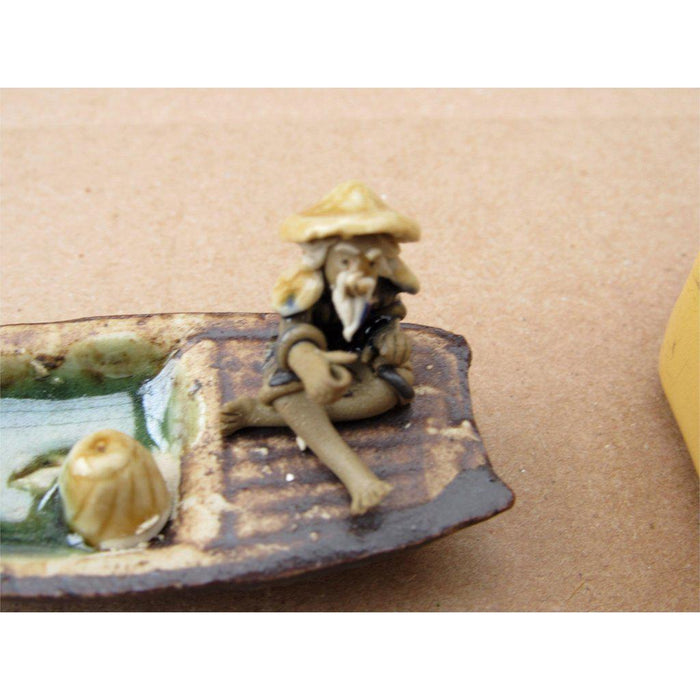 Fisherman On A Boat Fishing With Duck Ceramic Figurine Close