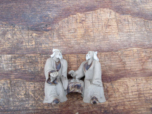 Friends On A Bench With A Book Figurine