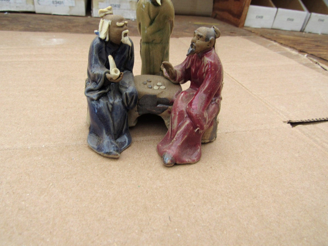 Men Playing Go Figurine Go Board