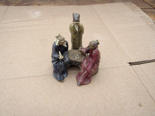 Men Playing Go Figurine