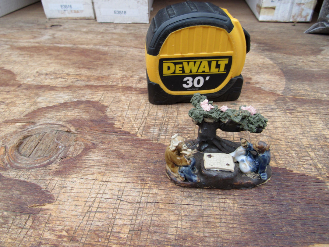 Men Playing Under Cherry Blossom Figurine Size