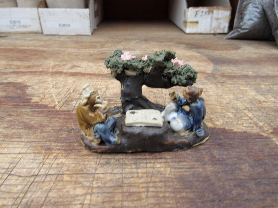 Men Playing Under Cherry Blossom Figurine Profile