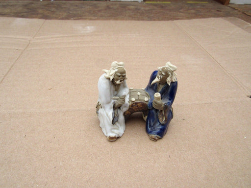Two Men On A Bench Figurine